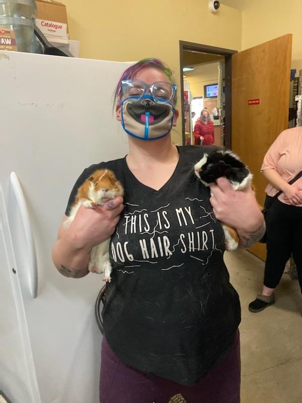 Bree from Nailed It Denver holds two guinea pigs.